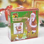 Сувенир "Дед Мороз" музыкальный 28см, в красной шубе на олене, микс (работает от 2*АА)