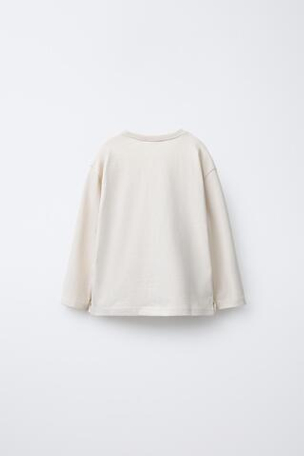 ZARA ФУТБОЛКА С БЛЕСТЯЩИМ ТЕКСТОВЫМ ПРИНТОМ, ЖЕМЧУЖНЫЙ МЕЛАНЖ