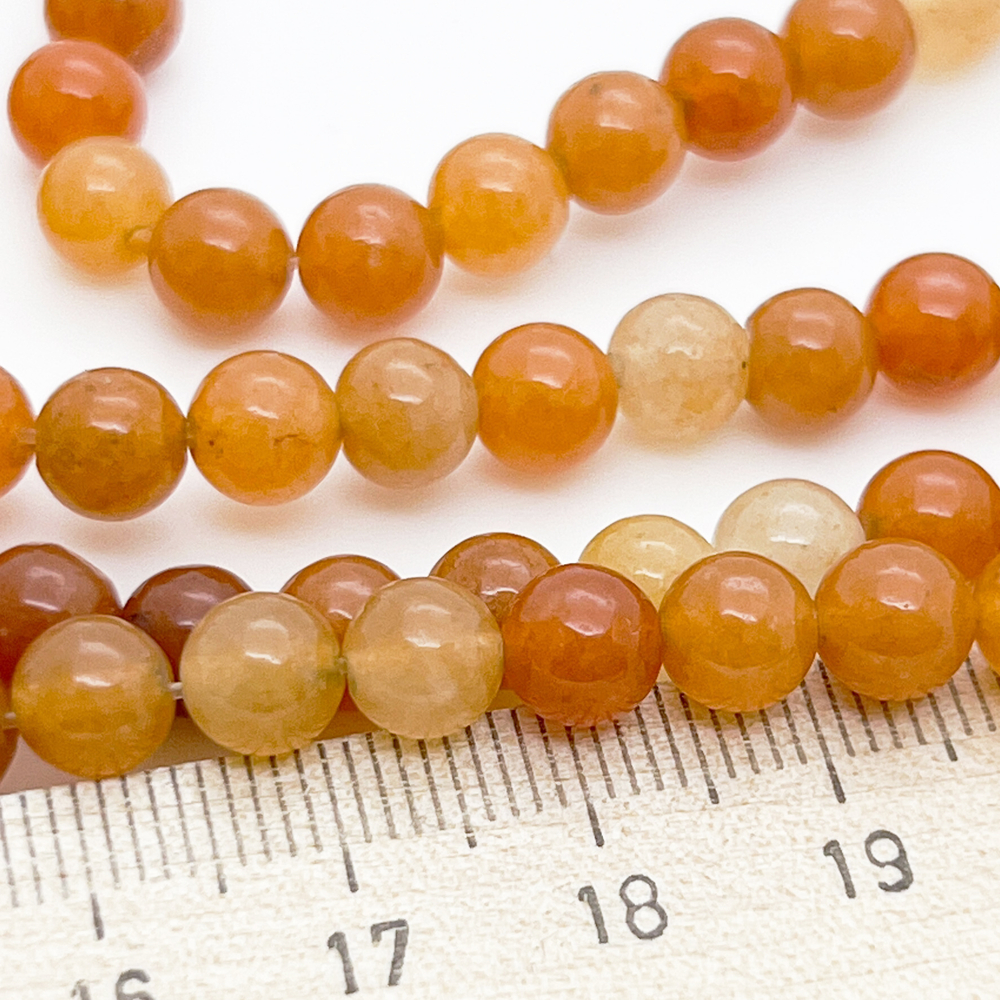 Авантюрин красный, размер 6,4-6,5 мм, цена за 28-29 шт (1/2 нити)