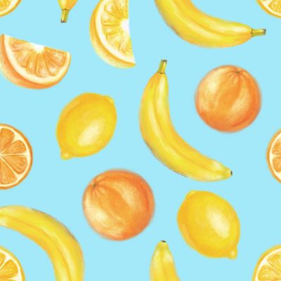 Апельсин, лимон, банан. Фрукты на голубом фоне