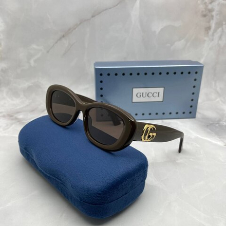 Солнцезащитные очки Gucci