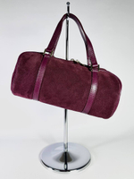 Женская замшевая сумка-бочонок цвета марсала