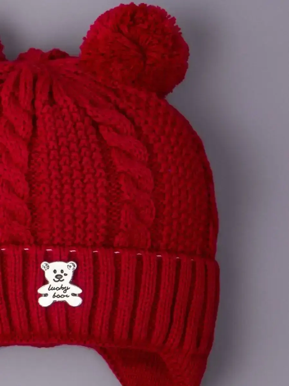 Шапка вязаная демисезонная на завязках