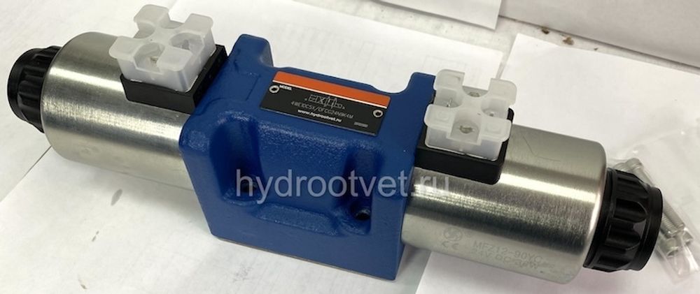 4WE10J5X/EG24N9K4/M -  Гидрораспределитель золотниковый Ду 10 (серия 5X) с электроуправлением G24, схема J (34), возврат - пружинный