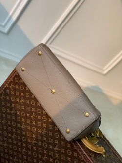 Louis Vuitton Lock It MM Bag