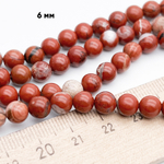 Яшма красная бусины, диаметр около 6,1-6,2 мм, цена за 30-31 шт (1/2 нити)