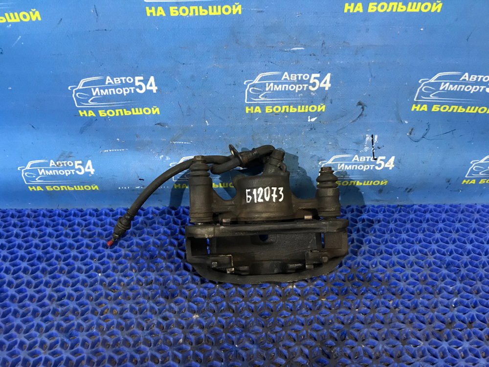 Суппорт тормозной передний левый TOYOTA RAUM 1997-2003