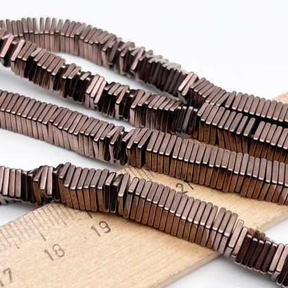 Гематит Квадрат бусины (имитация), цвет коричневый, размер около 1*6 мм, цена за отрезок 9-9,5 см (1/4 нити)