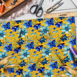Ткань интерлок синие цветы на жёлтом фоне