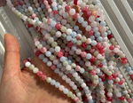 Нить бусин из тонированного кварца 6,5мм, гладкие