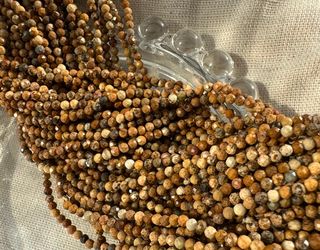 Нить бусин из яшмы 2,2мм, огранка