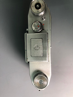 Praktica + Biometar 5,8cm 1:2, зеркало исцарапано, присутствуют пузырьки воздуха.