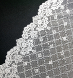 Вышивка на сетке белая К136