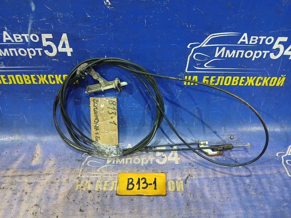 Трос лючка бензобака NISSAN SUNNY 1990