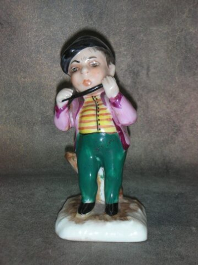 Статуэтка. Фарфор. Горбун флейтист. Volkstedt. Германия