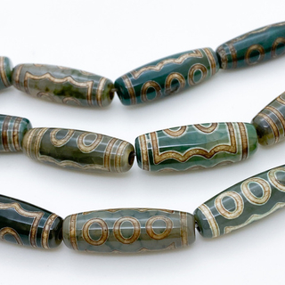 "Дзи" 5 Глаз, размер около 30*10 мм, цена за 1 шт