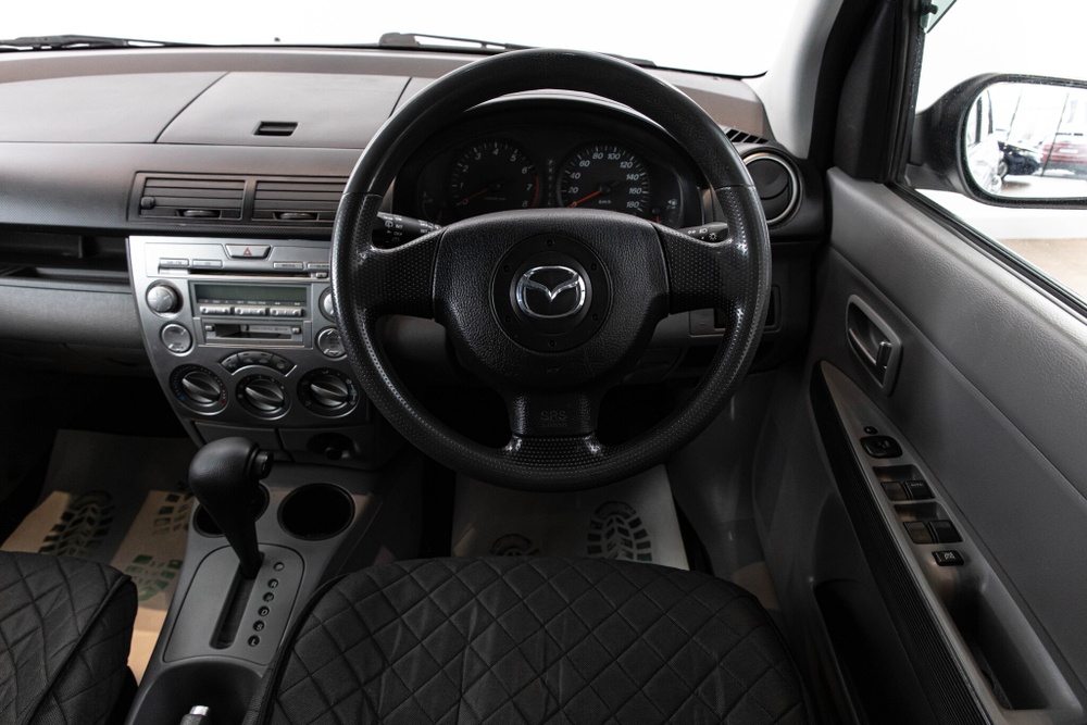 Mazda Demio, 2006 год