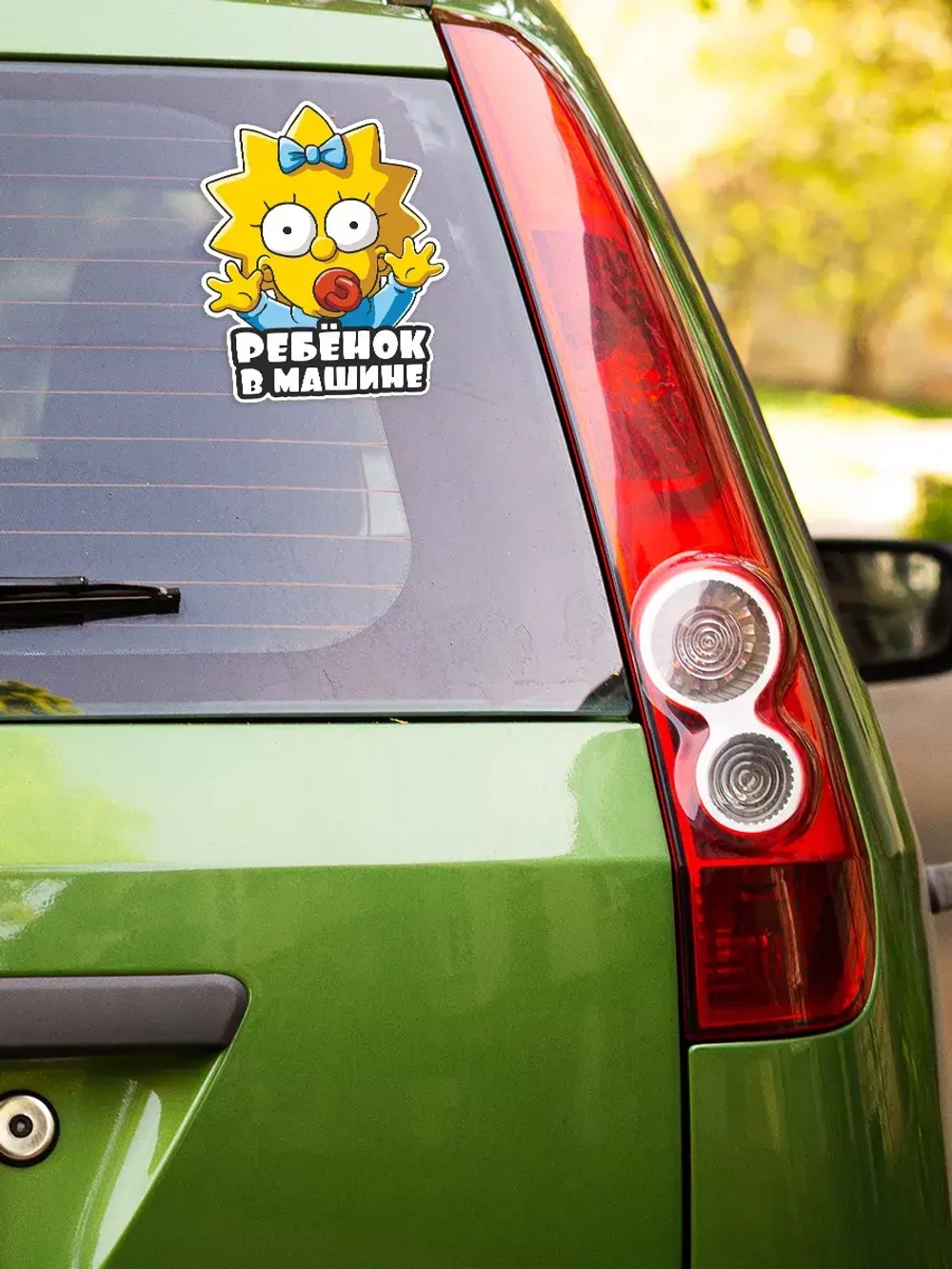 Наклейка автомобильная "Симпсоны" ребенок в машине