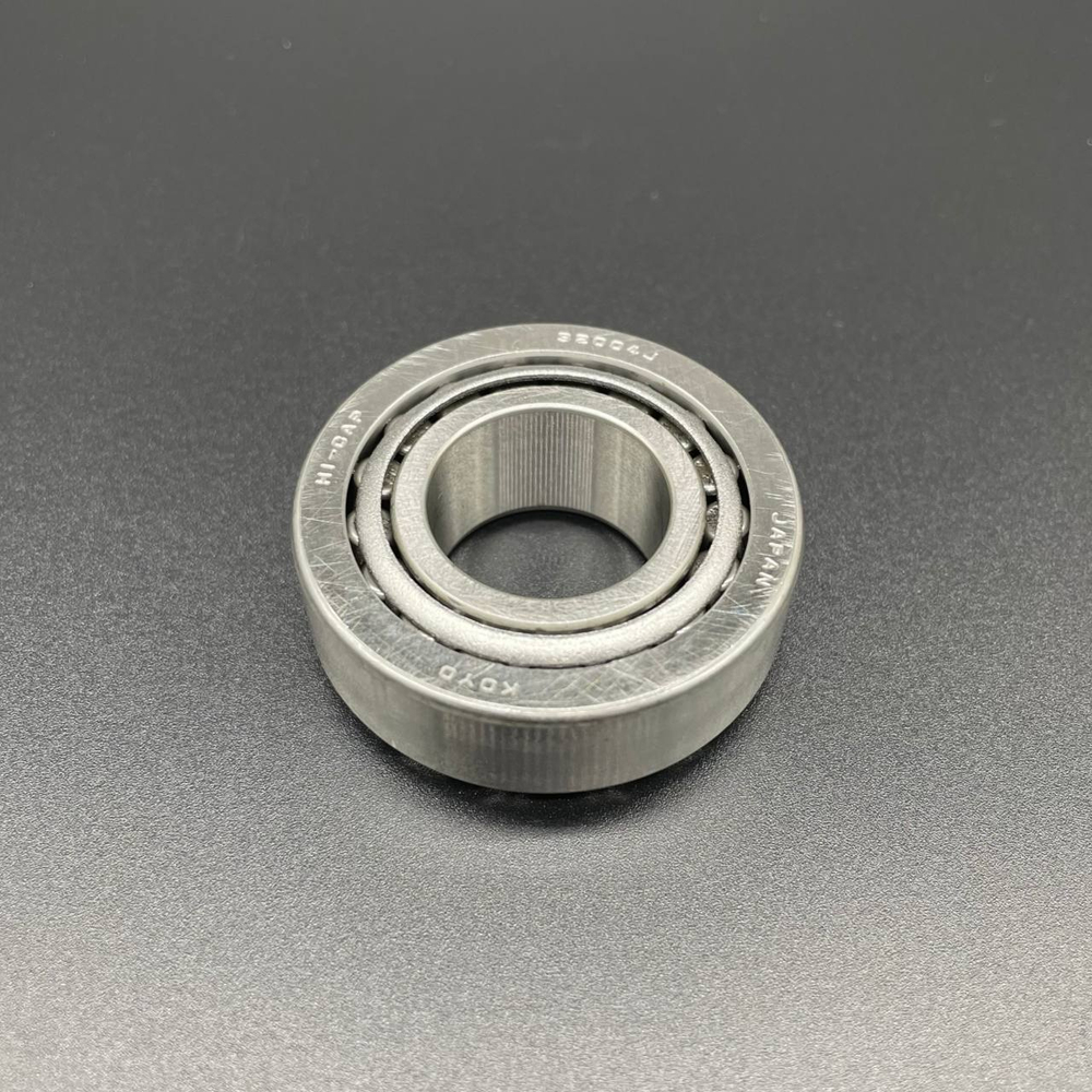 Подшипник роликовый конический ведущего вала редуктора 93332-000W5