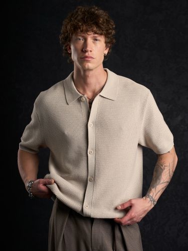 Бежевая трикотажная рубашка Laine с коротким рукавом