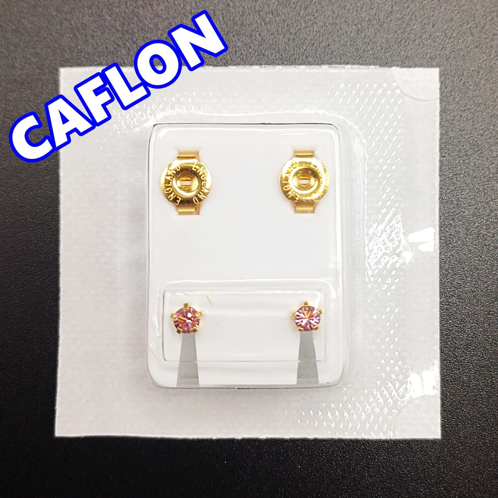 Серьги-гвоздики для прокола ушей под пистолет. CAFLON (Англия). Золотистые с сиреневыми ( Июнь) кристаллами, крапление