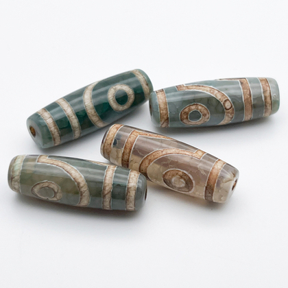 "Дзи" 2 Глаза, размер около 30*10 мм, цена за 1 шт