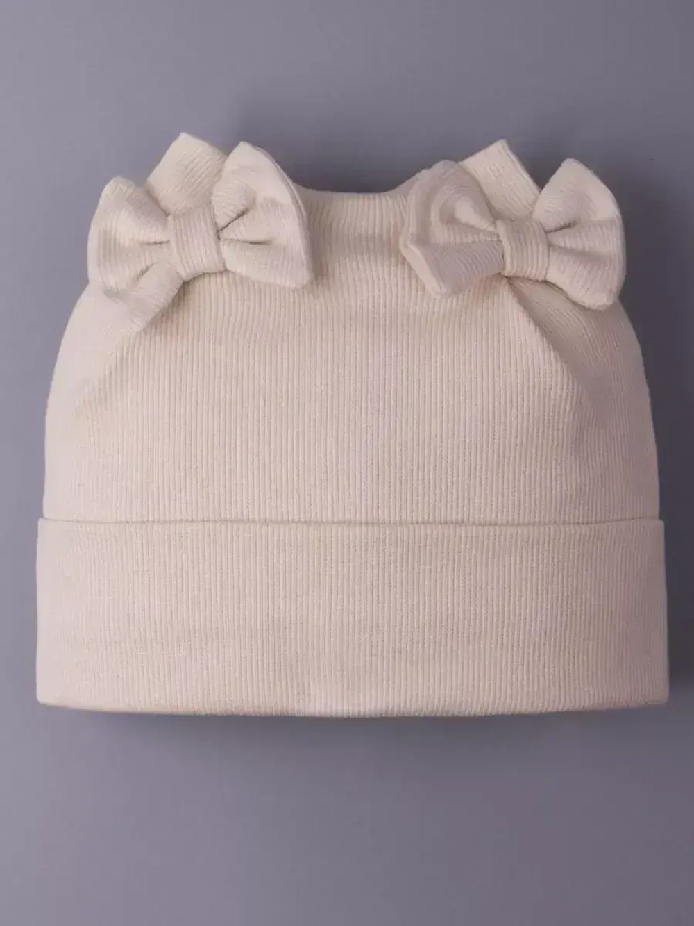 Шапка для девочки осенняя с бантиками