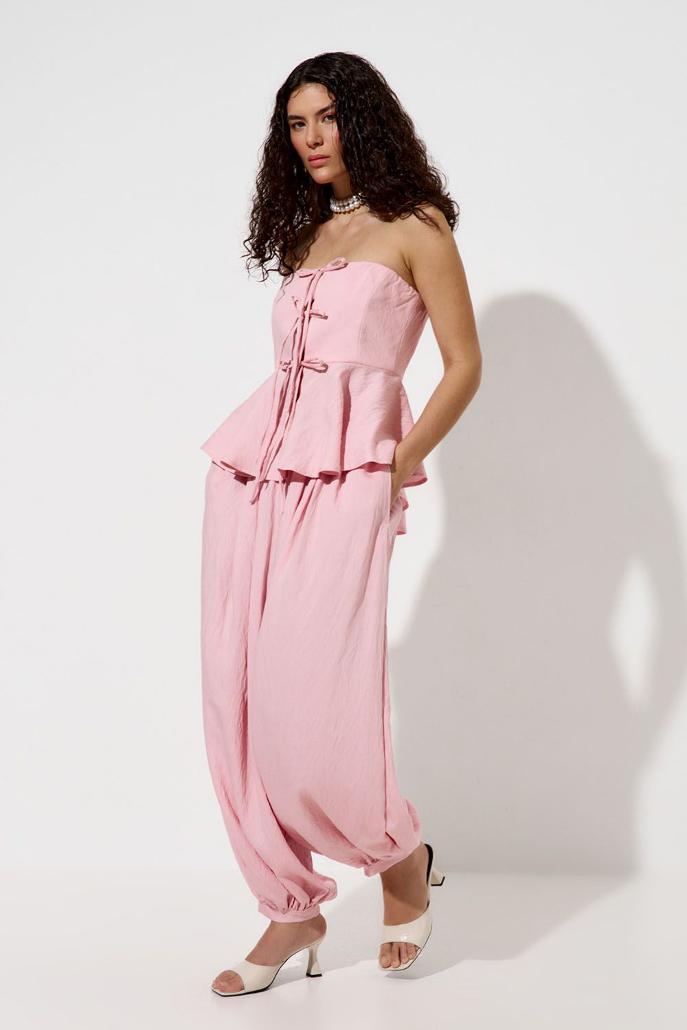 Брюки алладины из вискозы розового цвета