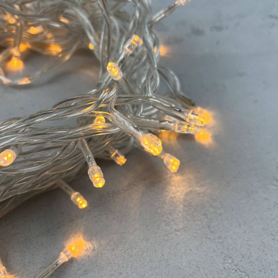 Светодиодная нить 100 желтых LED ламп, 10 м., 24В., прозрачный провод ПВХ, LTC (PST100-10-1Y)