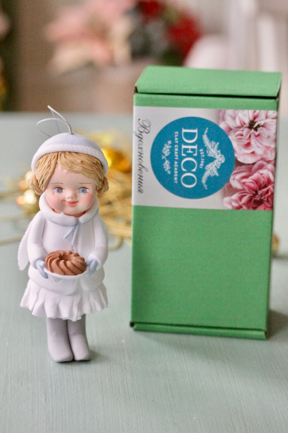 Елочная игрушка Пупсик из полимерной глины Мальчик в синей шапке