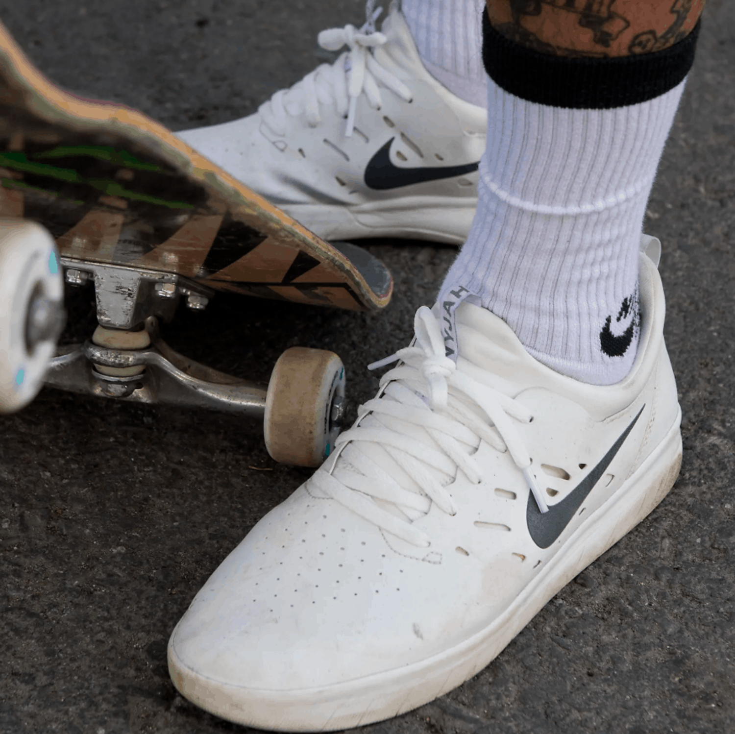 all white nike spikes