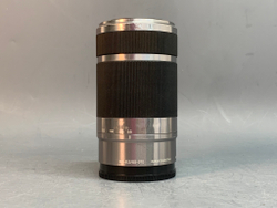 Sony 55-210mm f/4.5-6.3 E OSS внутри налет в виде точек