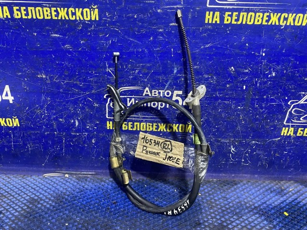 Трос ручника левый TOYOTA CAMI 2000-2006