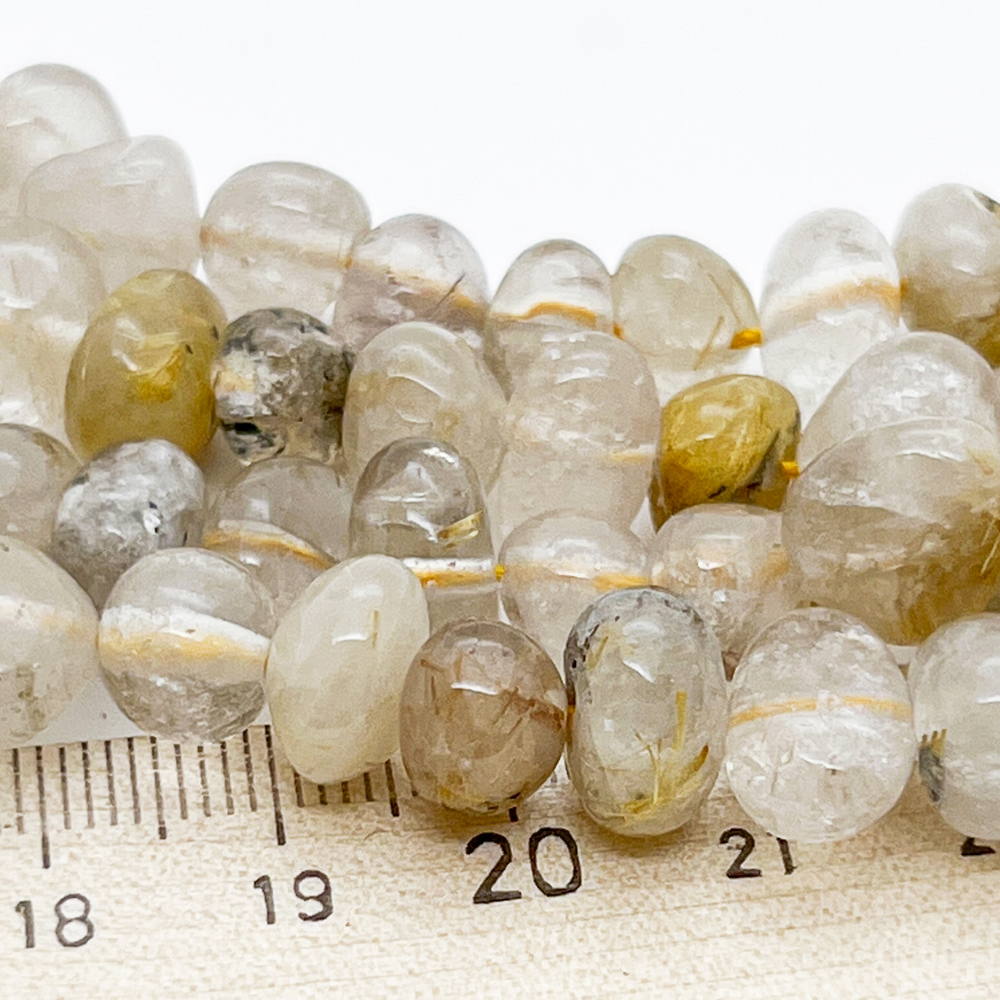 Кварц рутиловый, размер около 6-7*8-10 мм, цена за 27-28 шт (1/2 нити)