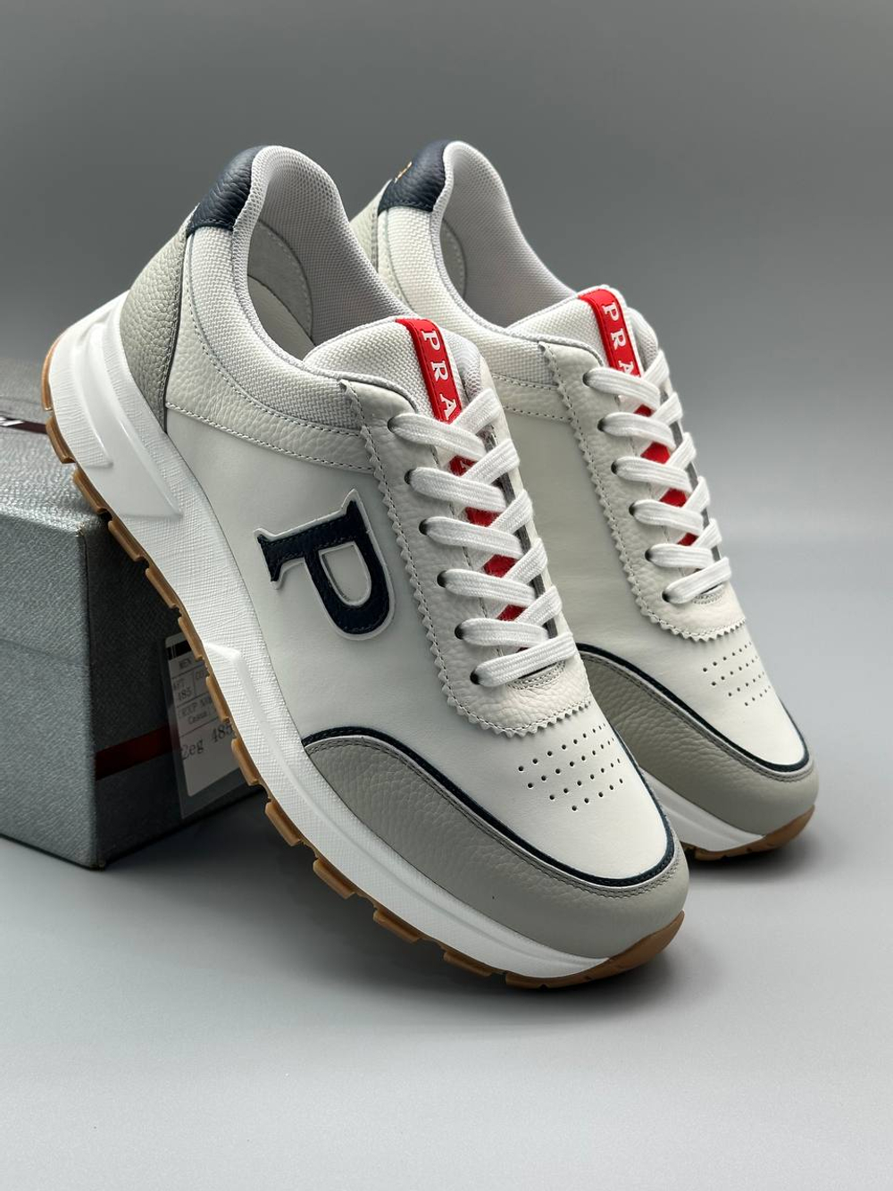 Кроссовки Prada