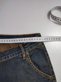 Джинсы с меховыми лампасами 46 размер