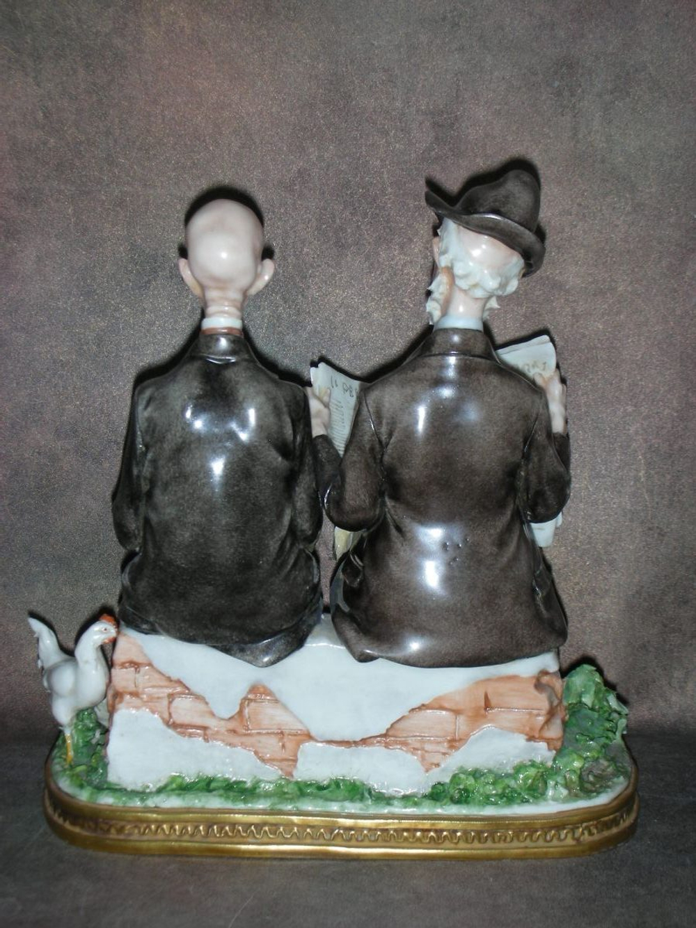 Статуэтка. Фарфор. Утренние новости. Capodimonte. Италия