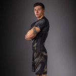 Рашгард Venum Matupa Short Sleeve black/grey/gold