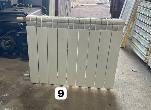 Биметаллический радиатор Б/У 500 9 секц. бок.