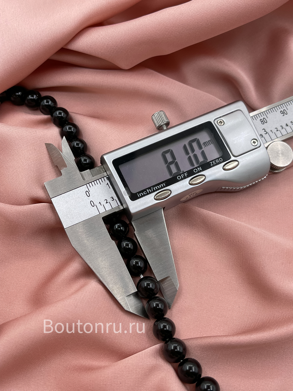 Жемчуг черный на нити