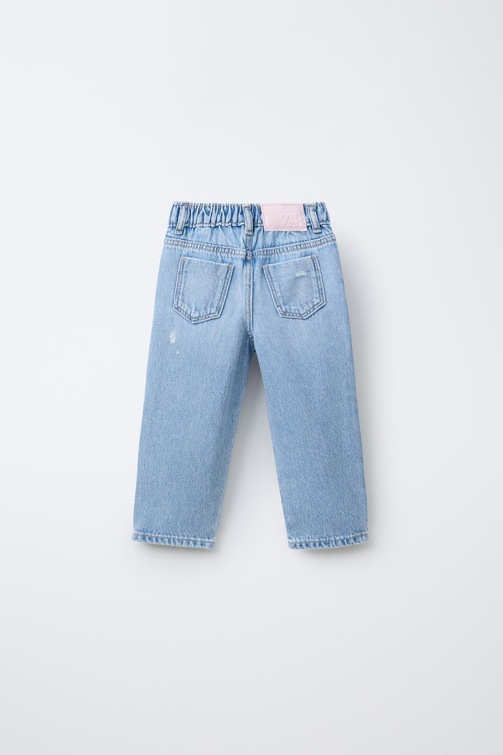 Джинсы mom fit с разрезами