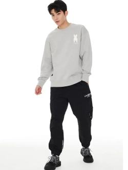 Брюки-джоггеры в стиле карго с молниями на карманах