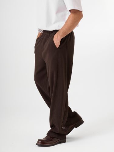 Терракотовые трикотажные брюки QWE