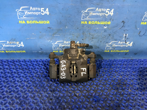 Суппорт тормозной передний левый Honda LOGO 2000