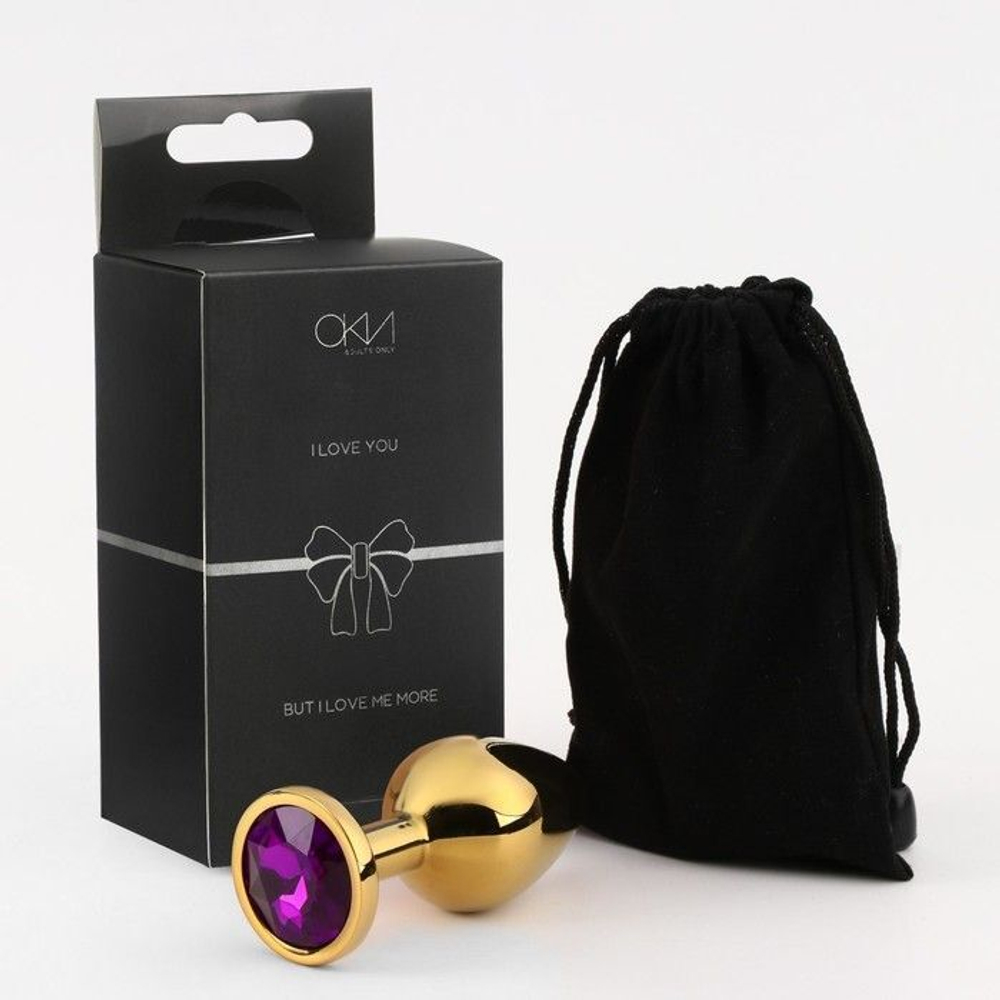 Золотистая анальная пробка с фиолетовым кристаллом - 8,5 см. (Цвет: фиолетовый)