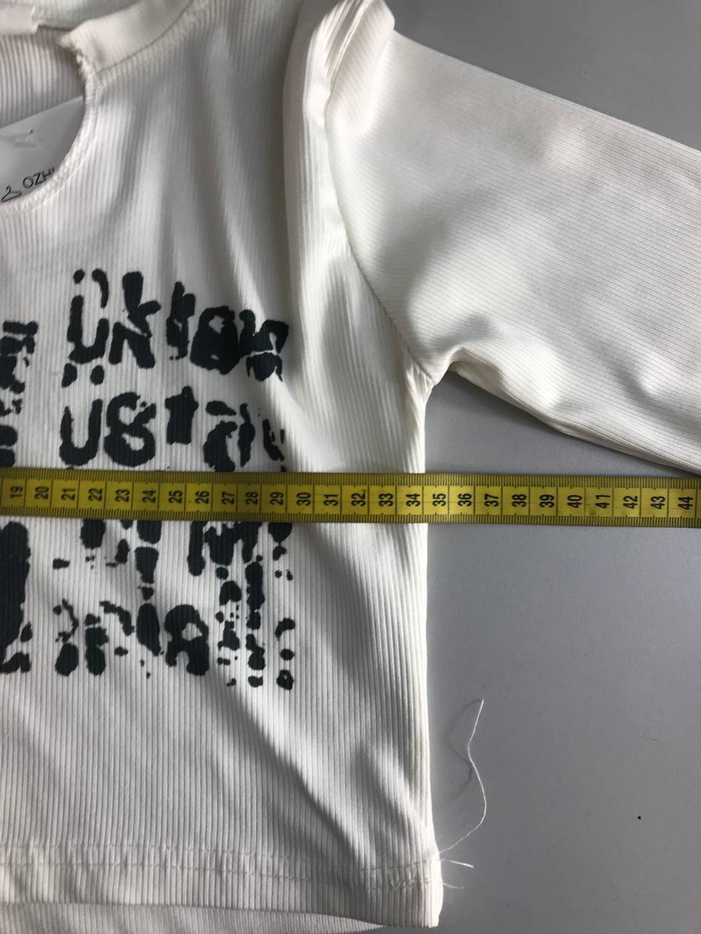 Футболка в рубчик стильная, маркировка S, визуально на 44 размер