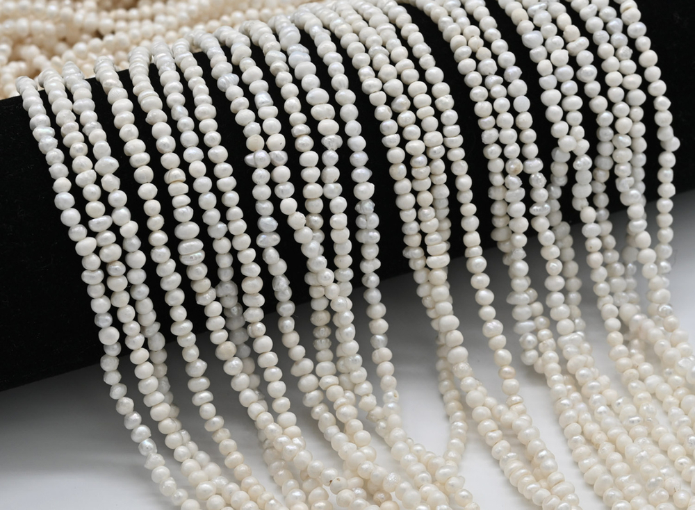 18506 Жемчуг "Овал" 8*6мм, нить 34см