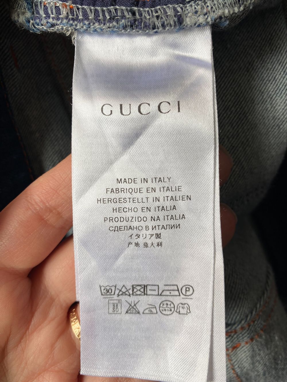 Джинсы Gucci, 140