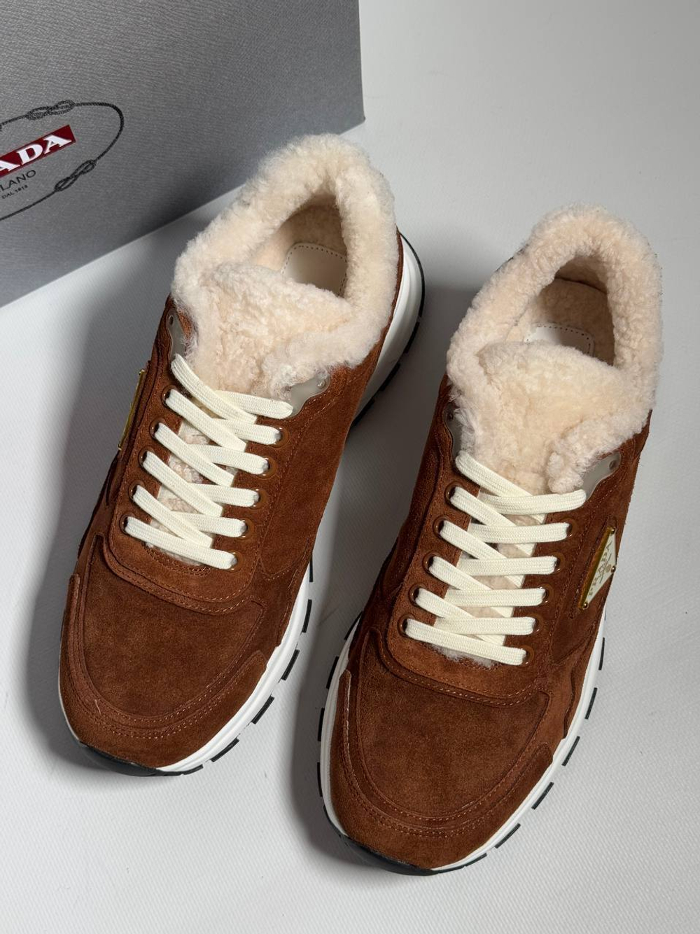 Кроссовки Prada