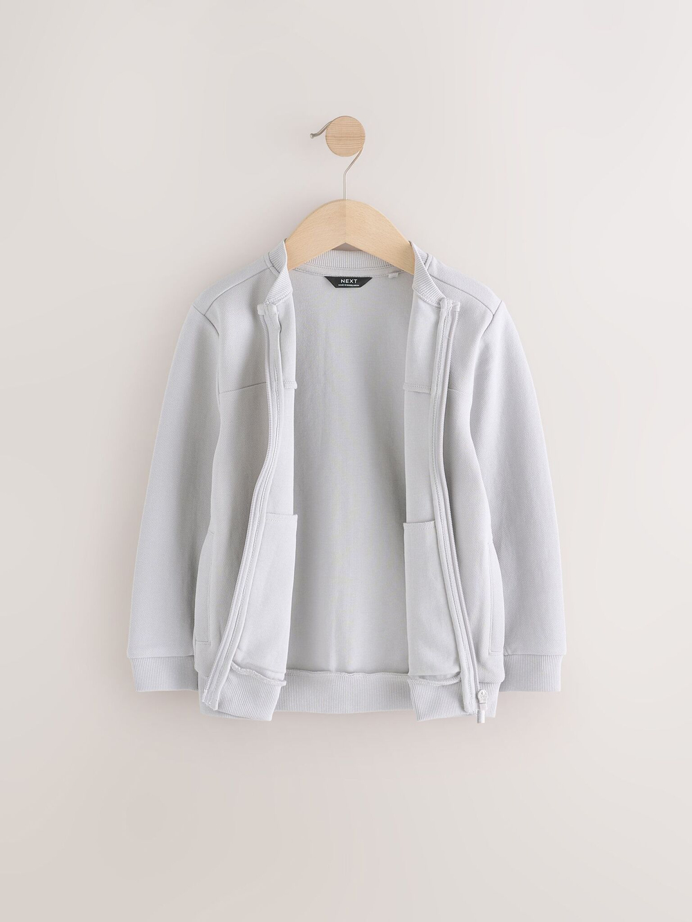 Бомбер на молнии для мальчика Next E43-864, Свтело-серый
